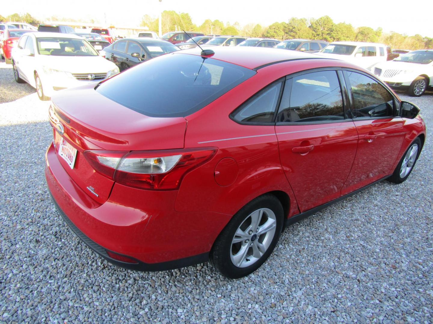 2014 Red Ford Focus (1FADP3F22EL) with an 4 Cyl engine, Automatic transmission, located at 15016 S Hwy 231, Midland City, AL, 36350, (334) 983-3001, 31.306210, -85.495277 - Photo#7