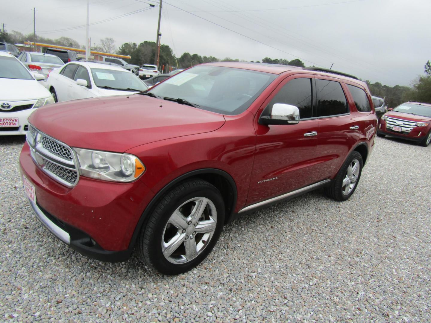 2011 Red /Tan Dodge Durango (1D4RD5GG4BC) with an 6 Cyl engine, Automatic transmission, located at 15016 S Hwy 231, Midland City, AL, 36350, (334) 983-3001, 31.306210, -85.495277 - Photo#2