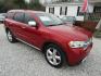 2011 Red /Tan Dodge Durango (1D4RD5GG4BC) with an 6 Cyl engine, Automatic transmission, located at 15016 S Hwy 231, Midland City, AL, 36350, (334) 983-3001, 31.306210, -85.495277 - Photo#0