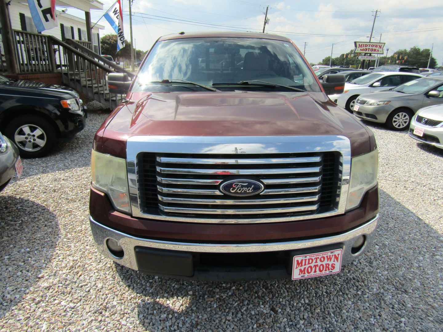 2010 Cooper /Tan Ford F-150 (1FTEX1C81AF) with an 8 Cyl engine, Automatic transmission, located at 15016 S Hwy 231, Midland City, AL, 36350, (334) 983-3001, 31.306210, -85.495277- Photo#1