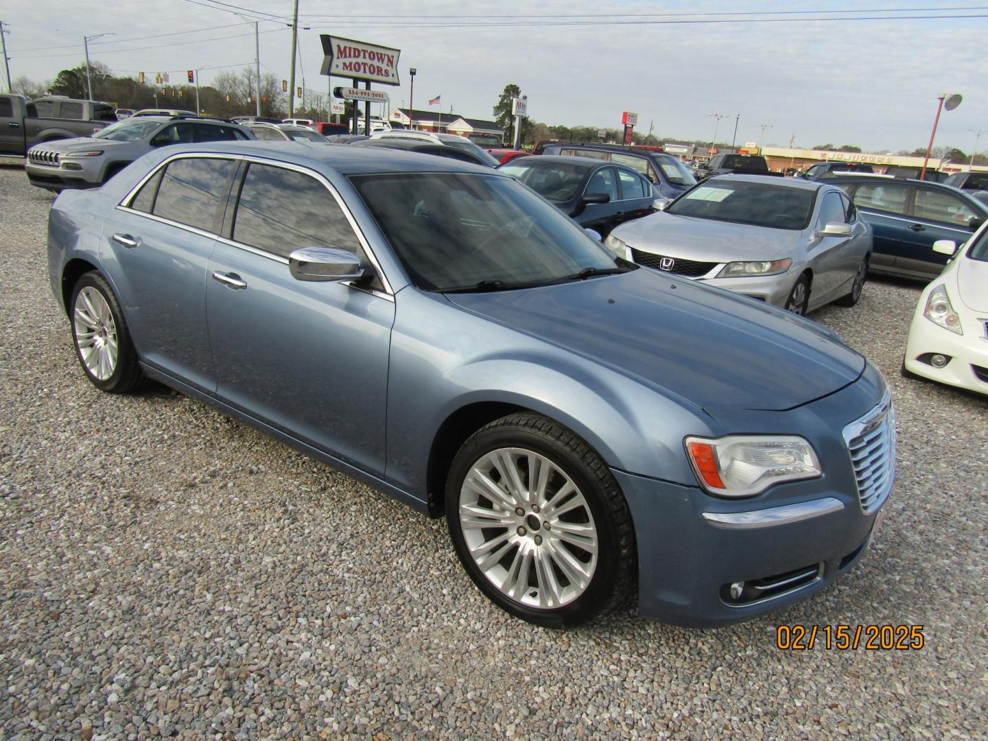 2011 Blue /Tan Chrysler 300 C RWD (2C3CA6CT4BH) with an 5.7L V8 OHV 16V engine, Automatic transmission, located at 15016 S Hwy 231, Midland City, AL, 36350, (334) 983-3001, 31.306210, -85.495277 - Photo#0