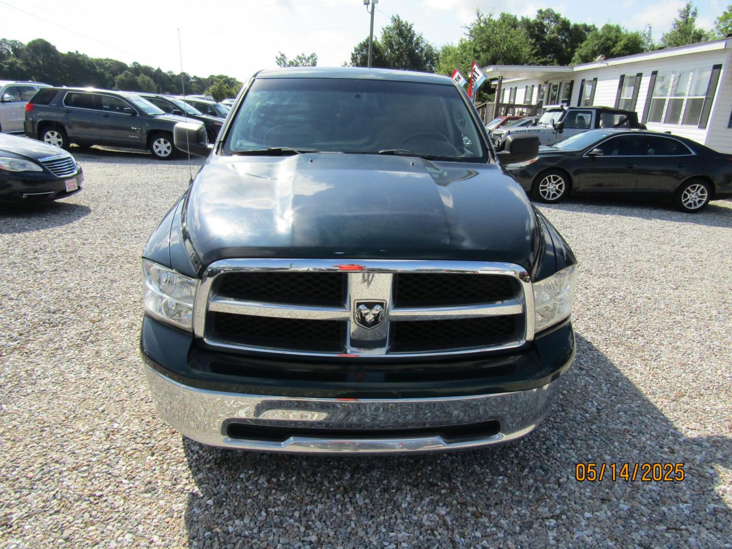 2011 Green /Brown Dodge Ram 1500 SLT Quad Cab 2WD (1D7RB1GP7BS) with an 4.7L V8 SOHC 16V FFV engine, Automatic transmission, located at 15016 S Hwy 231, Midland City, AL, 36350, (334) 983-3001, 31.306210, -85.495277 - Photo#1