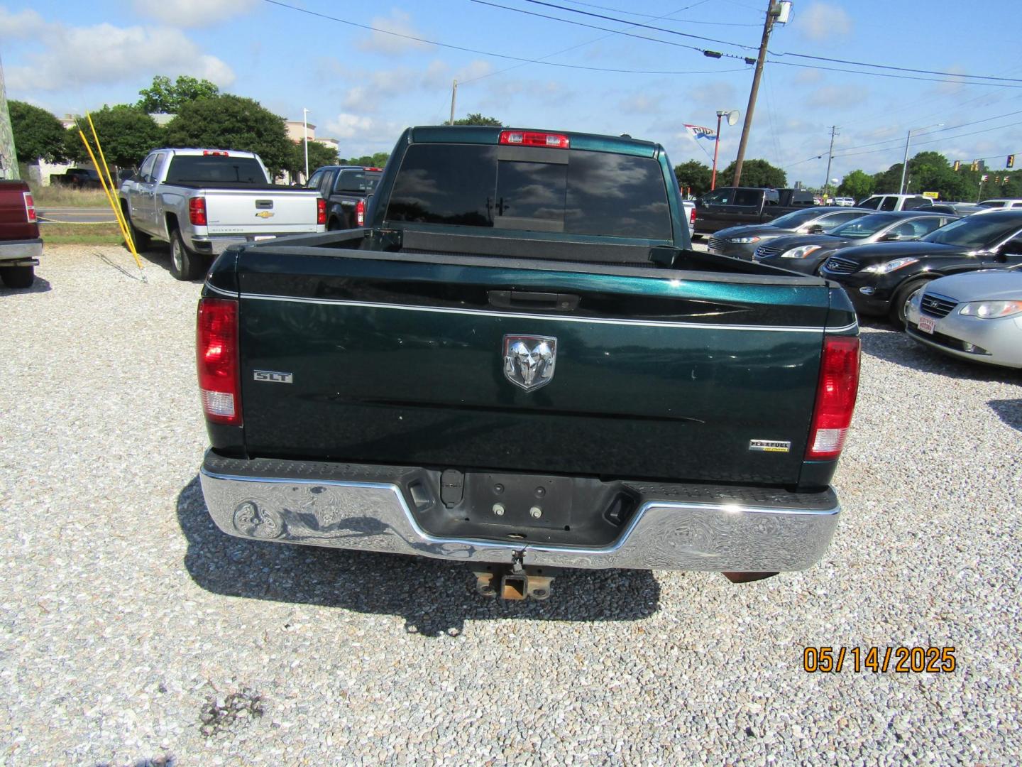 2011 Green /Brown Dodge Ram 1500 SLT Quad Cab 2WD (1D7RB1GP7BS) with an 4.7L V8 SOHC 16V FFV engine, Automatic transmission, located at 15016 S Hwy 231, Midland City, AL, 36350, (334) 983-3001, 31.306210, -85.495277 - Photo#6