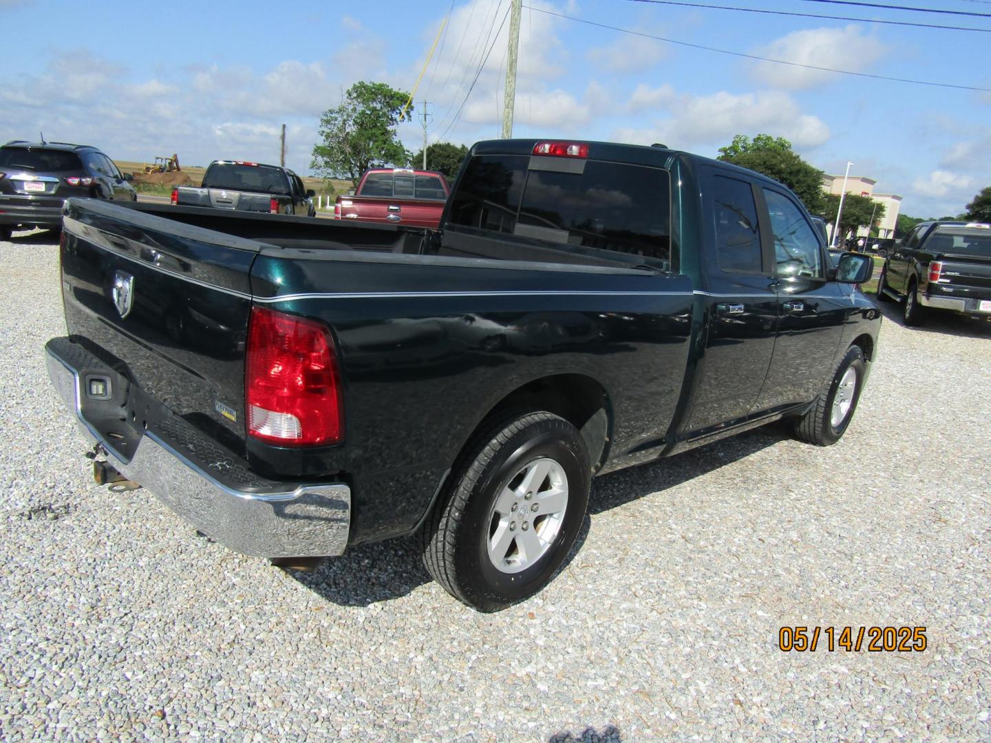 2011 Green /Brown Dodge Ram 1500 SLT Quad Cab 2WD (1D7RB1GP7BS) with an 4.7L V8 SOHC 16V FFV engine, Automatic transmission, located at 15016 S Hwy 231, Midland City, AL, 36350, (334) 983-3001, 31.306210, -85.495277 - Photo#7