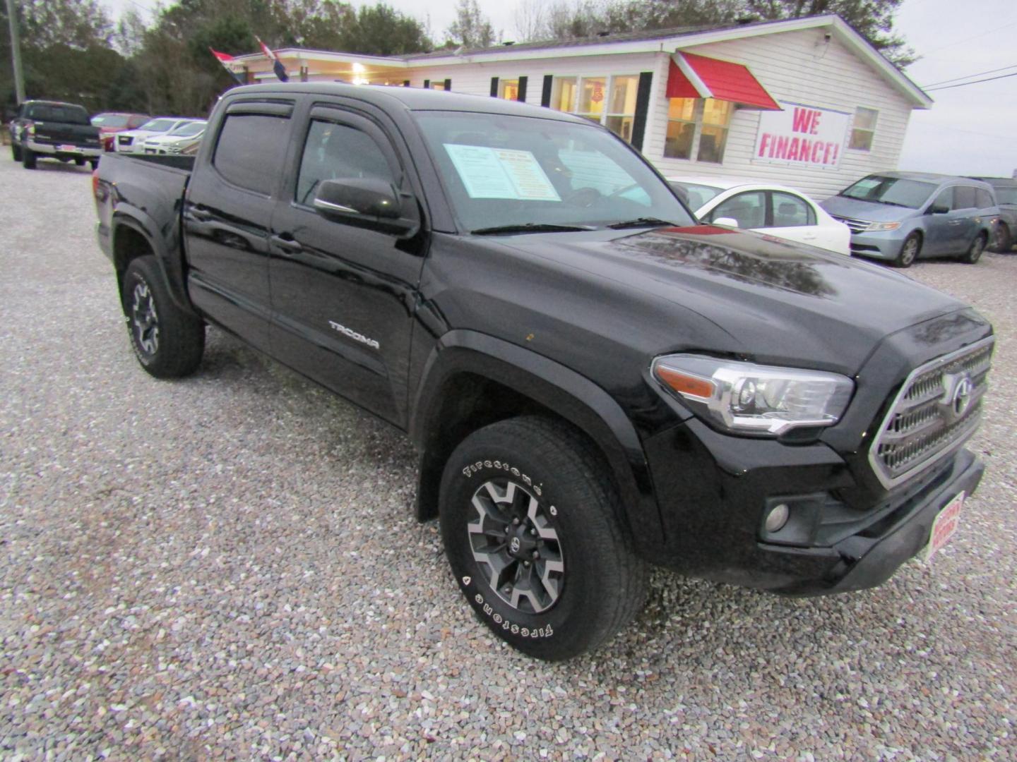 2016 Black /Gray Toyota Tacoma SR5 Double Cab Long Bed V6 5AT 2WD (5TFAZ5CN4GX) , Automatic transmission, located at 15016 S Hwy 231, Midland City, AL, 36350, (334) 983-3001, 31.306210, -85.495277 - Photo#0
