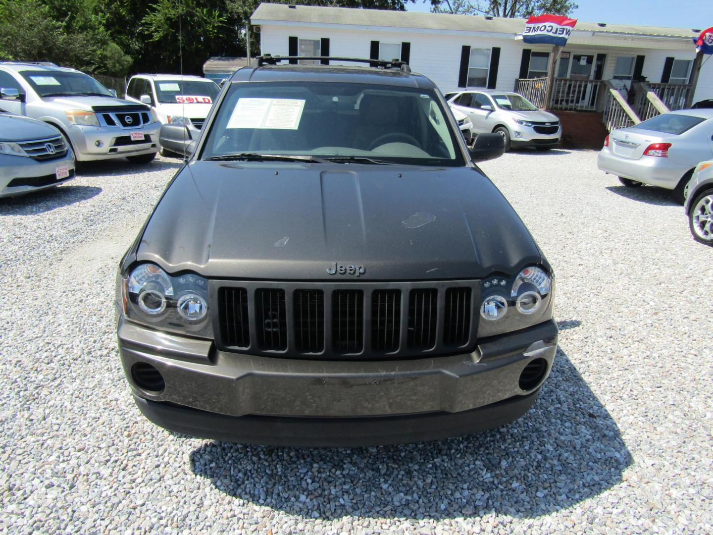 2006 Bronze /Tan Jeep Grand Cherokee Laredo 2WD (1J8GS48K86C) with an 3.7L V6 SOHC 12V engine, Automatic transmission, located at 15016 S Hwy 231, Midland City, AL, 36350, (334) 983-3001, 31.306210, -85.495277 - Photo#1