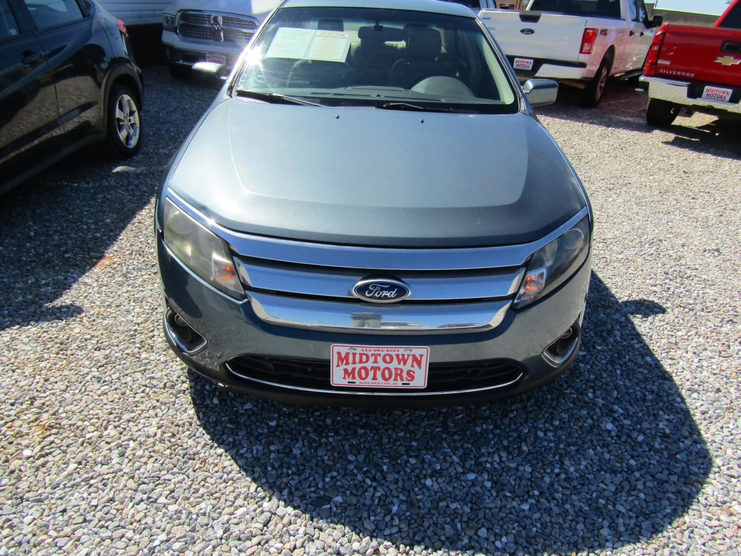 2011 Blue /Tan Ford Fusion I4 SEL (3FAHP0JA8BR) with an 2.5L L4 DOHC 16V engine, Automatic transmission, located at 15016 S Hwy 231, Midland City, AL, 36350, (334) 983-3001, 31.306210, -85.495277- Photo#1