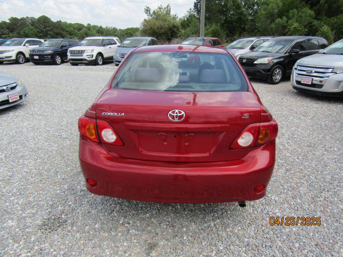 2010 Red Toyota Corolla Base 4-Speed AT (1NXBU4EE5AZ) with an 1.8L L4 DOHC 16V engine, Automatic transmission, located at 15016 S Hwy 231, Midland City, AL, 36350, (334) 983-3001, 31.306210, -85.495277 - Photo#5