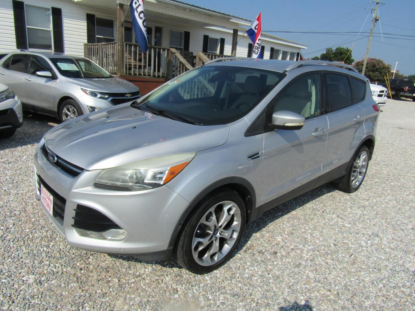 2014 Silver /Gray Ford Escape Titanium FWD (1FMCU0J96EU) with an 2.0L L4 DOHC 16V engine, Automatic transmission, located at 15016 S Hwy 231, Midland City, AL, 36350, (334) 983-3001, 31.306210, -85.495277 - Photo#2
