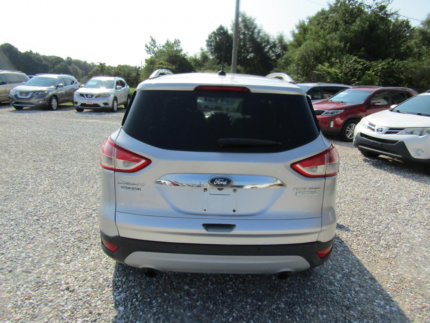 2014 Silver /Gray Ford Escape Titanium FWD (1FMCU0J96EU) with an 2.0L L4 DOHC 16V engine, Automatic transmission, located at 15016 S Hwy 231, Midland City, AL, 36350, (334) 983-3001, 31.306210, -85.495277 - Photo#6