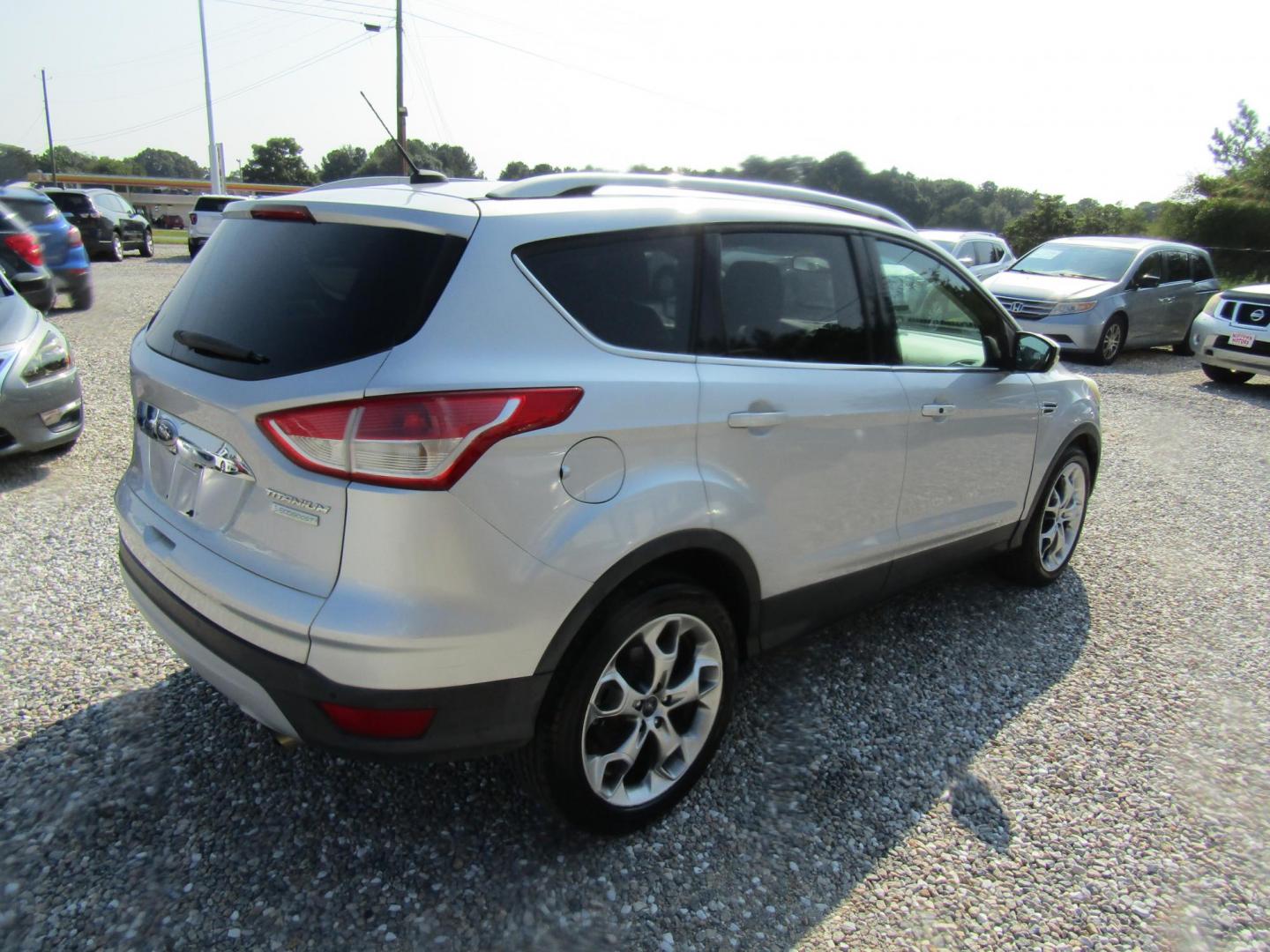 2014 Silver /Gray Ford Escape Titanium FWD (1FMCU0J96EU) with an 2.0L L4 DOHC 16V engine, Automatic transmission, located at 15016 S Hwy 231, Midland City, AL, 36350, (334) 983-3001, 31.306210, -85.495277 - Photo#7