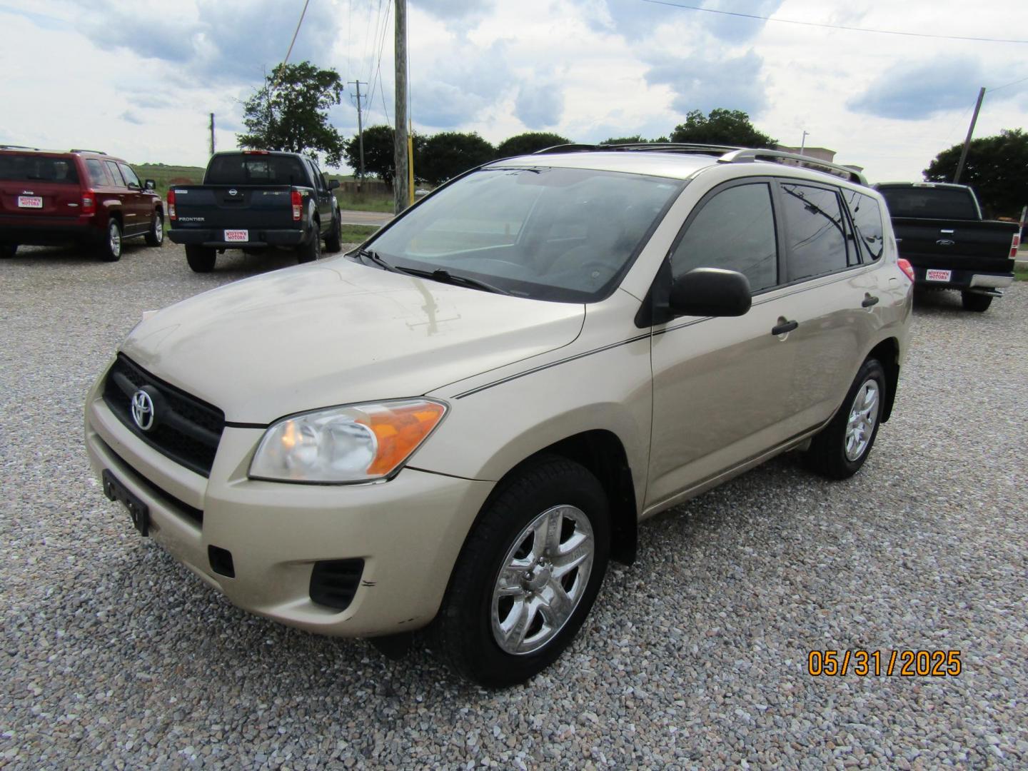2011 Gold /Tan Toyota RAV4 Base I4 2WD (2T3ZF4DV4BW) with an 2.4L L4 DOHC 16V engine, Automatic transmission, located at 15016 S Hwy 231, Midland City, AL, 36350, (334) 983-3001, 31.306210, -85.495277 - Photo#2