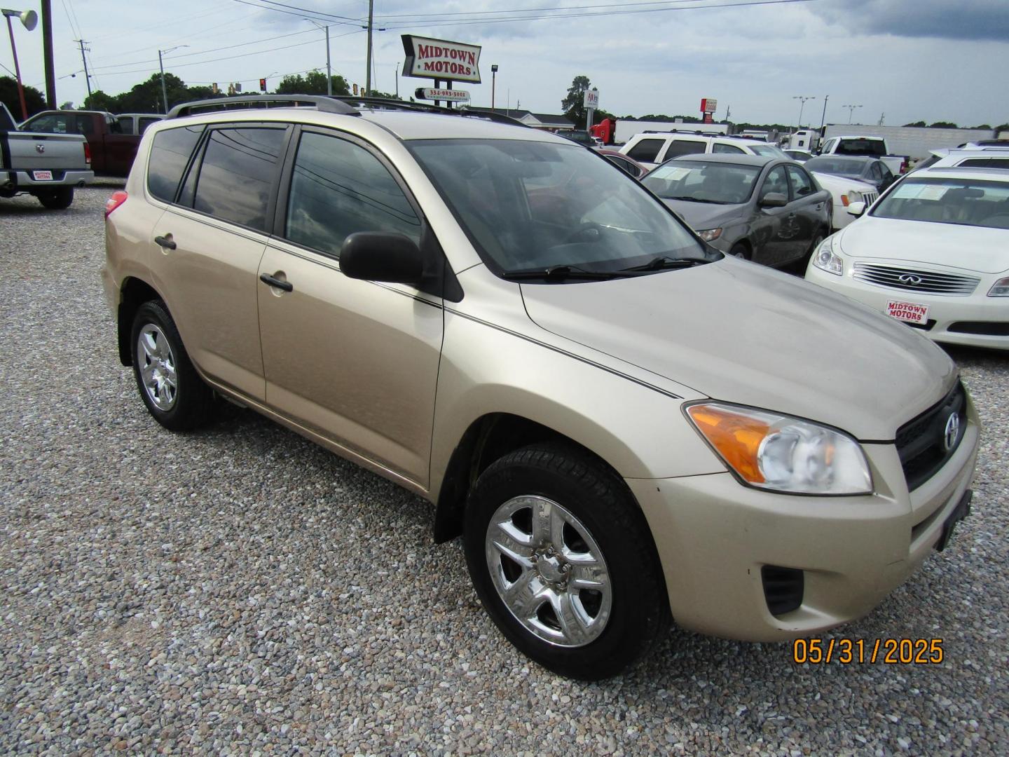 2011 Gold /Tan Toyota RAV4 Base I4 2WD (2T3ZF4DV4BW) with an 2.4L L4 DOHC 16V engine, Automatic transmission, located at 15016 S Hwy 231, Midland City, AL, 36350, (334) 983-3001, 31.306210, -85.495277 - Photo#0