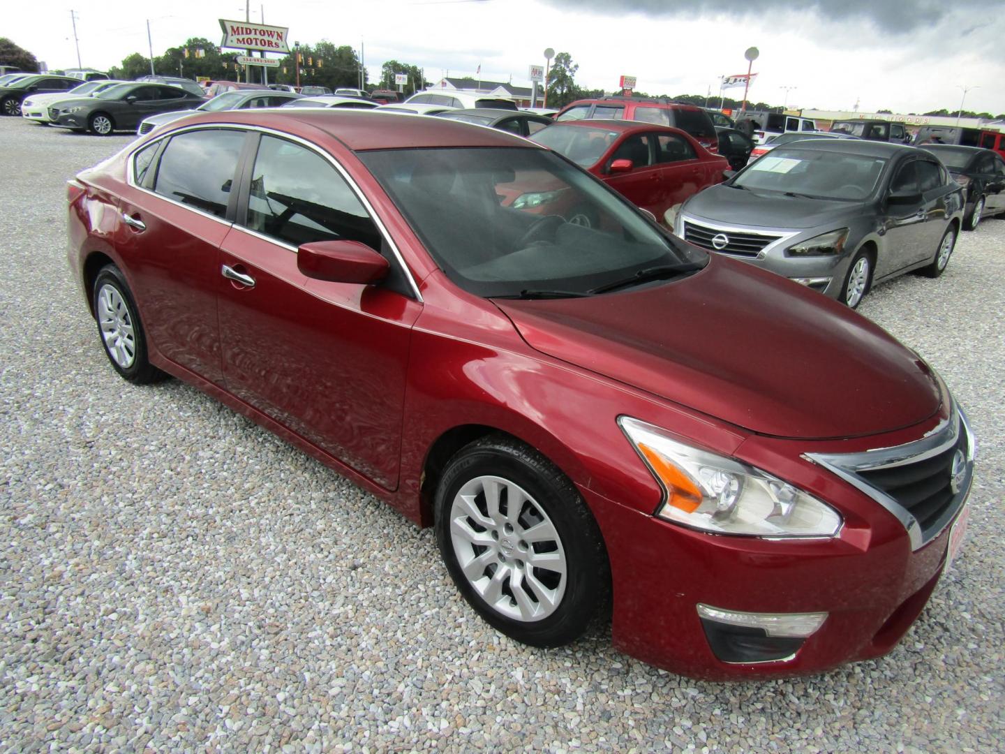 2013 Red Nissan Altima 2.5 S (1N4AL3AP8DC) with an 2.5L L4 DOHC 16V engine, Automatic transmission, located at 15016 S Hwy 231, Midland City, AL, 36350, (334) 983-3001, 31.306210, -85.495277 - Photo#0