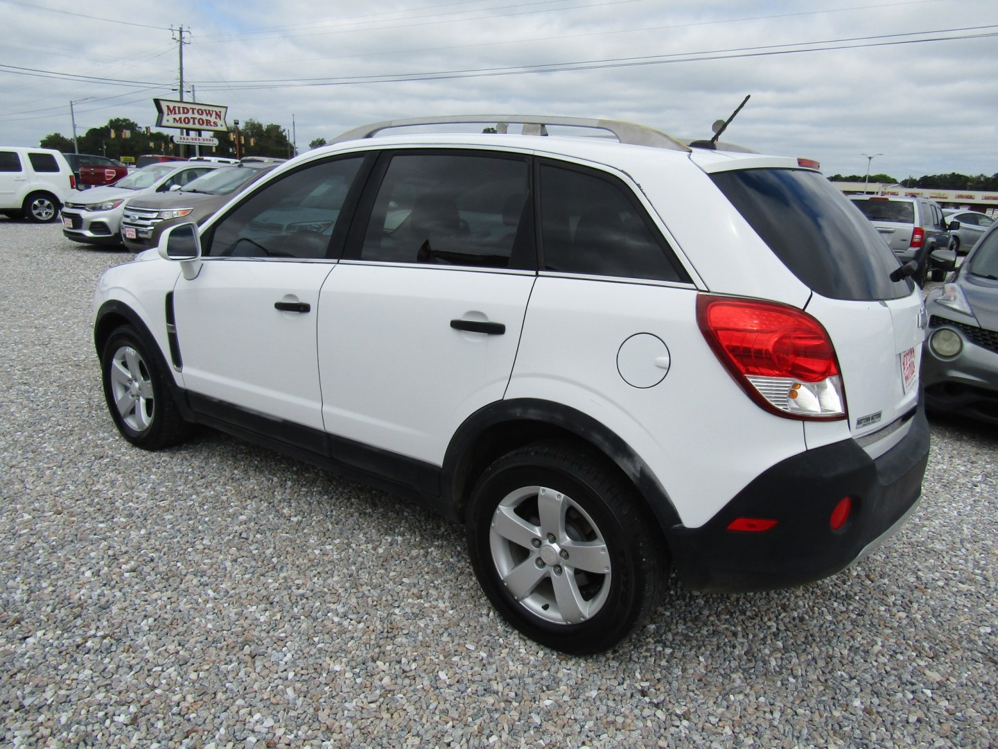2012 White Chevrolet Captiva Sport 1LS FWD (3GNAL1EK9CS) with an 2.4L L4 DOHC 16V FFV engine, Automatic transmission, located at 15016 S Hwy 231, Midland City, AL, 36350, (334) 983-3001, 31.306210, -85.495277- Photo#5