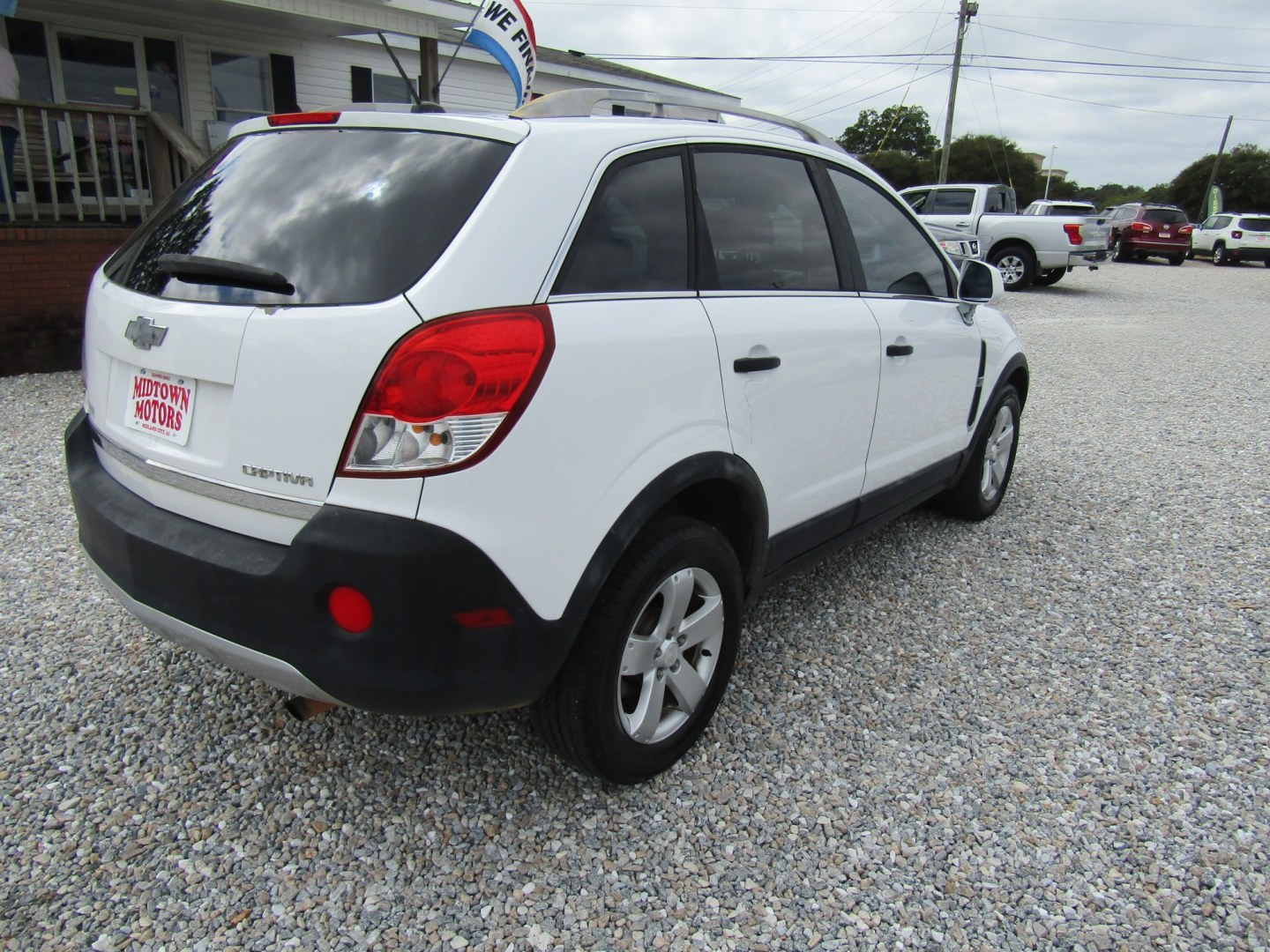 2012 White Chevrolet Captiva Sport 1LS FWD (3GNAL1EK9CS) with an 2.4L L4 DOHC 16V FFV engine, Automatic transmission, located at 15016 S Hwy 231, Midland City, AL, 36350, (334) 983-3001, 31.306210, -85.495277- Photo#7