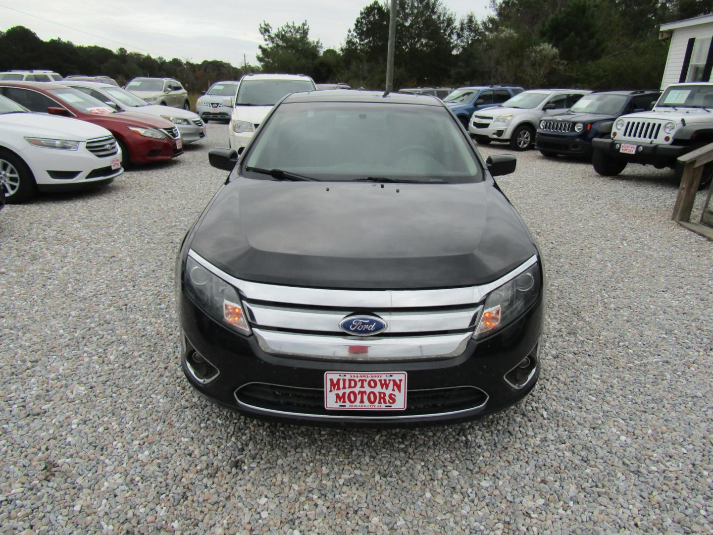 2011 Black /Black Ford Fusion I4 SEL (3FAHP0JA4BR) with an 2.5L L4 DOHC 16V engine, Automatic transmission, located at 15016 S Hwy 231, Midland City, AL, 36350, (334) 983-3001, 31.306210, -85.495277 - Photo#1