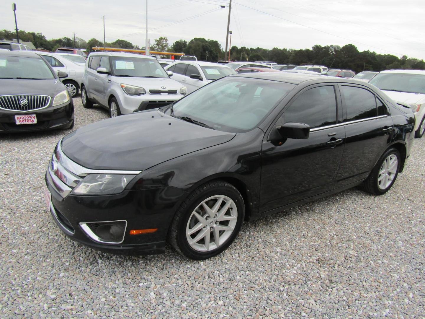 2011 Black /Black Ford Fusion I4 SEL (3FAHP0JA4BR) with an 2.5L L4 DOHC 16V engine, Automatic transmission, located at 15016 S Hwy 231, Midland City, AL, 36350, (334) 983-3001, 31.306210, -85.495277 - Photo#2