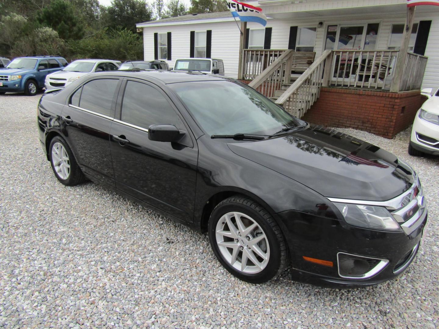 2011 Black /Black Ford Fusion I4 SEL (3FAHP0JA4BR) with an 2.5L L4 DOHC 16V engine, Automatic transmission, located at 15016 S Hwy 231, Midland City, AL, 36350, (334) 983-3001, 31.306210, -85.495277 - Photo#0