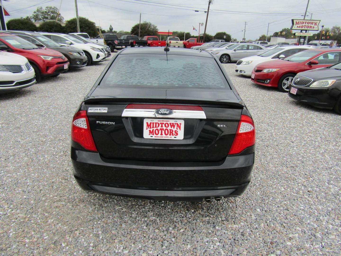 2011 Black /Black Ford Fusion I4 SEL (3FAHP0JA4BR) with an 2.5L L4 DOHC 16V engine, Automatic transmission, located at 15016 S Hwy 231, Midland City, AL, 36350, (334) 983-3001, 31.306210, -85.495277 - Photo#6
