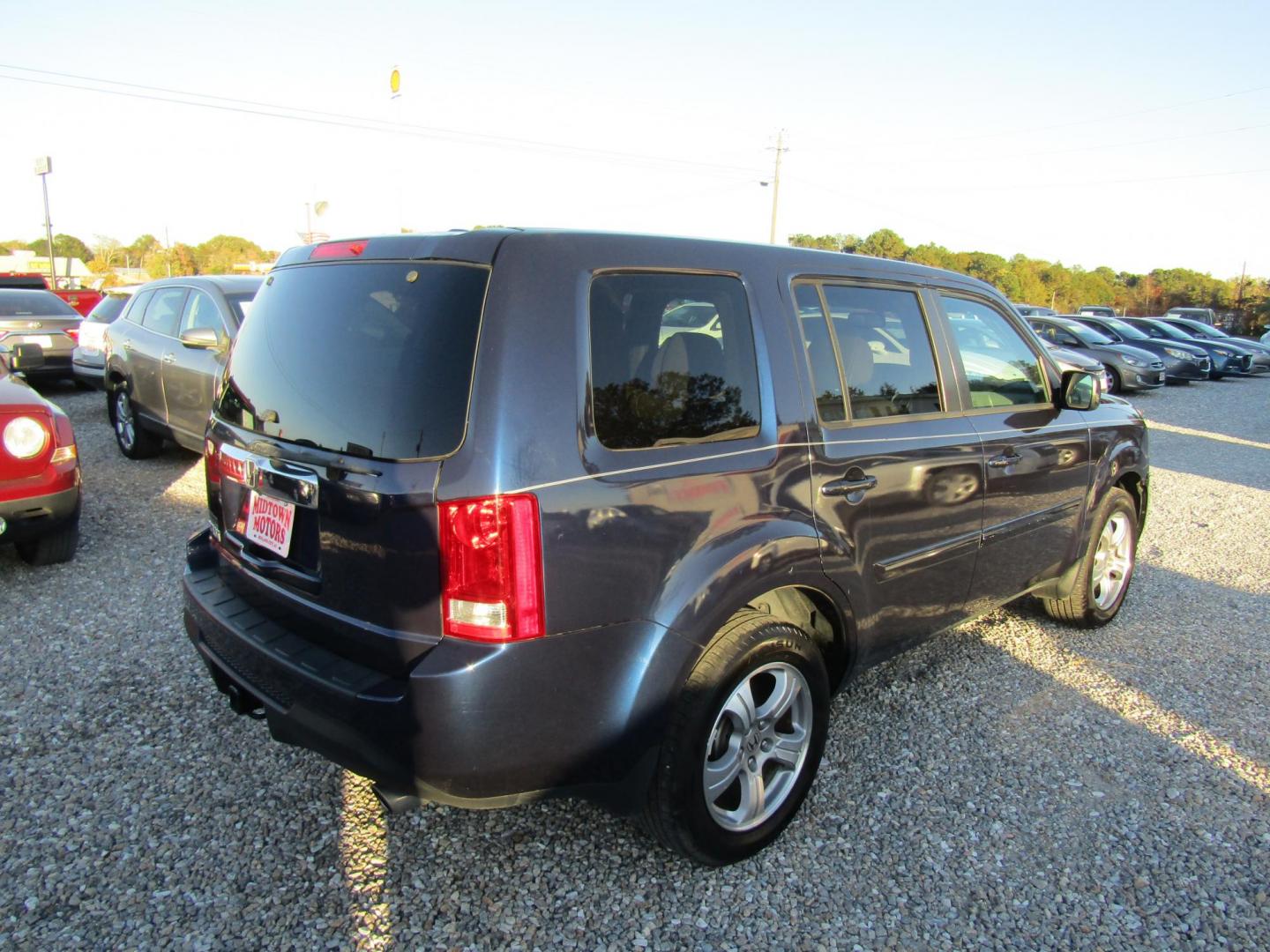 2013 Blue /Gray Honda Pilot EX-L 2WD 5-Spd AT (5FNYF3H54DB) with an 3.5L V6 SOHC 24V engine, Automatic transmission, located at 15016 S Hwy 231, Midland City, AL, 36350, (334) 983-3001, 31.306210, -85.495277 - Photo#7