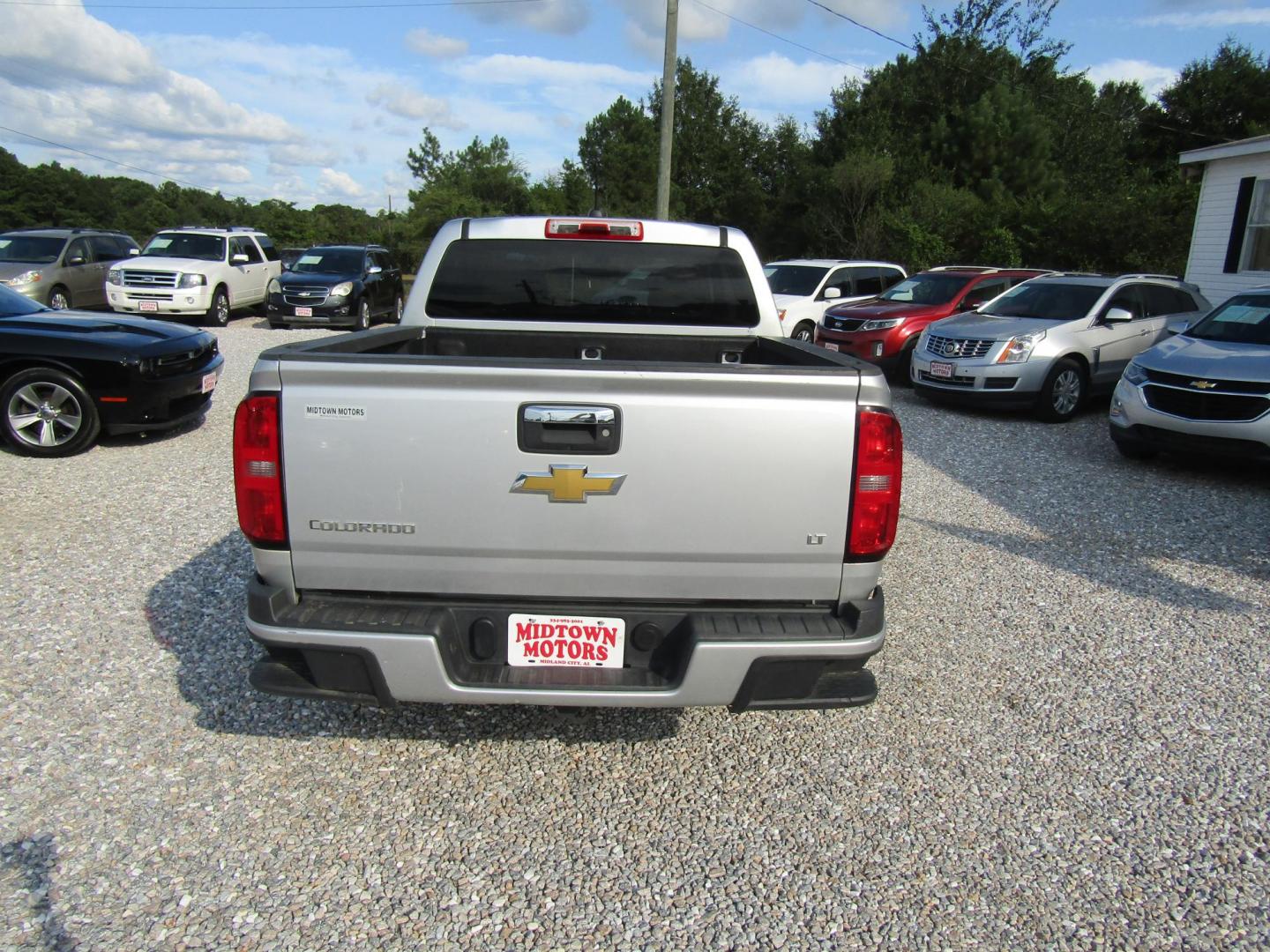 2015 Silver Chevrolet Colorado LT Crew Cab 2WD Long Box (1GCGSBEA1F1) with an 2.5L L4 DOHC 16V GAS engine, Automatic transmission, located at 15016 S Hwy 231, Midland City, AL, 36350, (334) 983-3001, 31.306210, -85.495277 - Photo#6