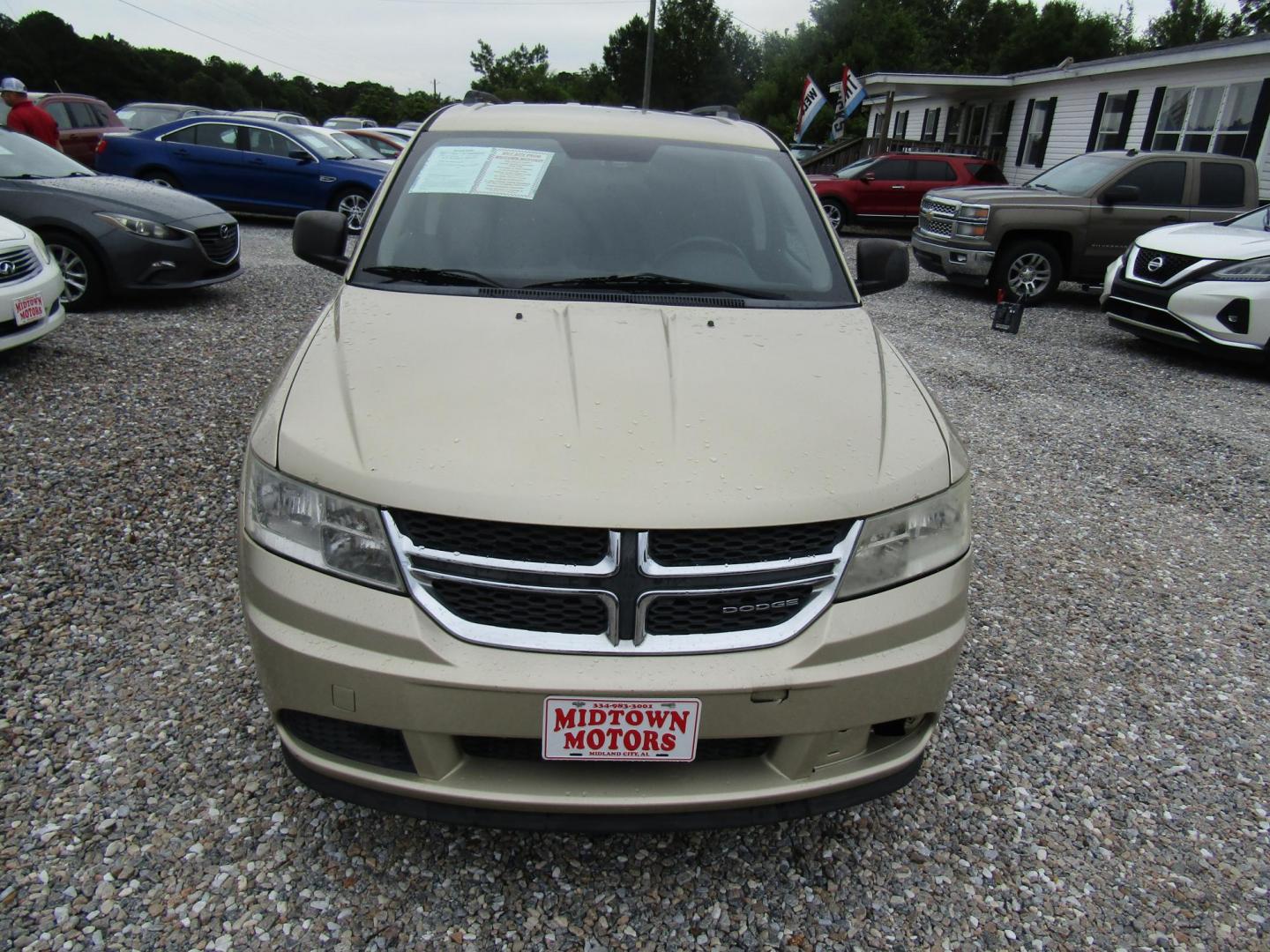 2011 Gold /Black Dodge Journey Express (3D4PG4FB0BT) with an 2.4L L4 DOHC 16V engine, Automatic transmission, located at 15016 S Hwy 231, Midland City, AL, 36350, (334) 983-3001, 31.306210, -85.495277 - Photo#1