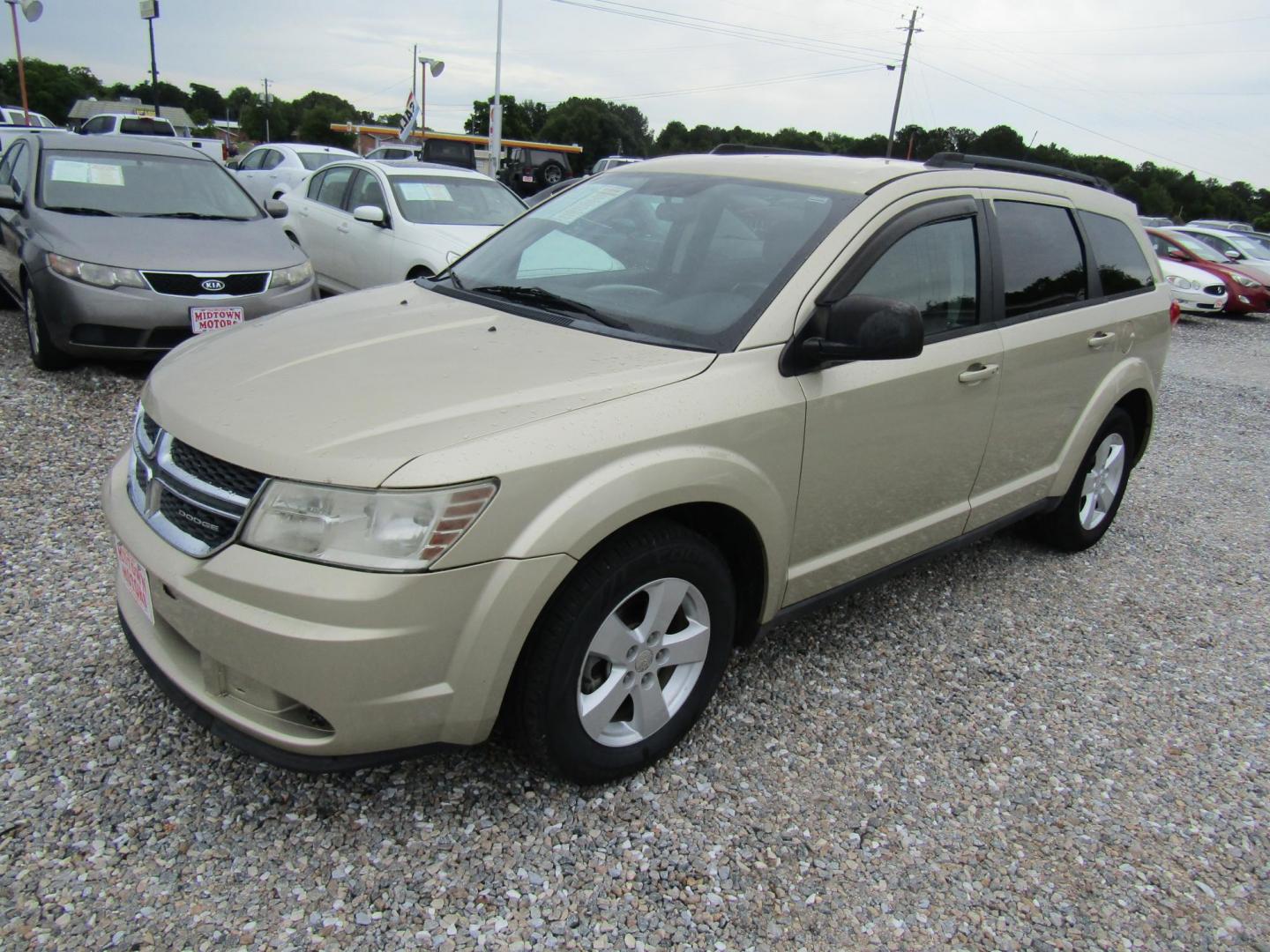 2011 Gold /Black Dodge Journey Express (3D4PG4FB0BT) with an 2.4L L4 DOHC 16V engine, Automatic transmission, located at 15016 S Hwy 231, Midland City, AL, 36350, (334) 983-3001, 31.306210, -85.495277 - Photo#2