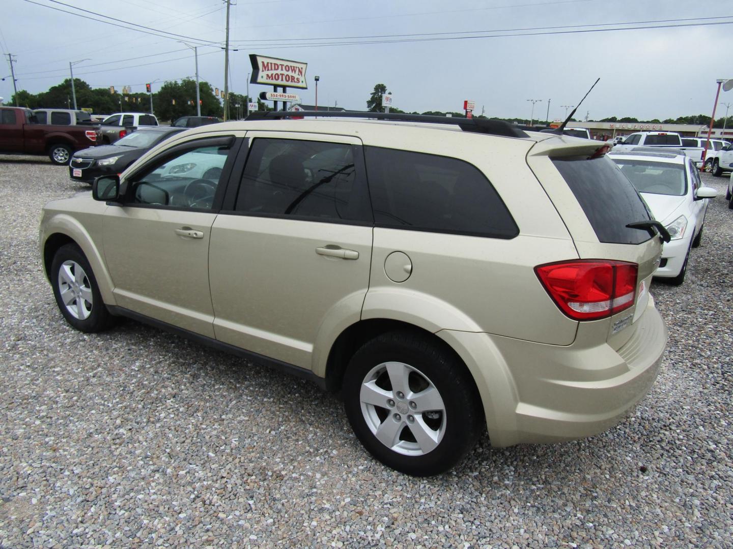 2011 Gold /Black Dodge Journey Express (3D4PG4FB0BT) with an 2.4L L4 DOHC 16V engine, Automatic transmission, located at 15016 S Hwy 231, Midland City, AL, 36350, (334) 983-3001, 31.306210, -85.495277 - Photo#5