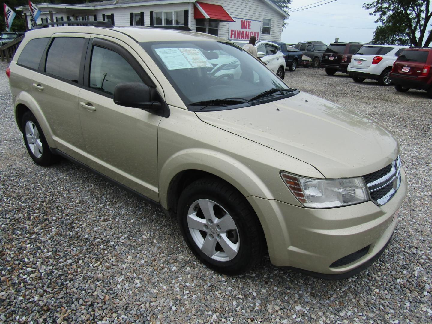 2011 Gold /Black Dodge Journey Express (3D4PG4FB0BT) with an 2.4L L4 DOHC 16V engine, Automatic transmission, located at 15016 S Hwy 231, Midland City, AL, 36350, (334) 983-3001, 31.306210, -85.495277 - Photo#0
