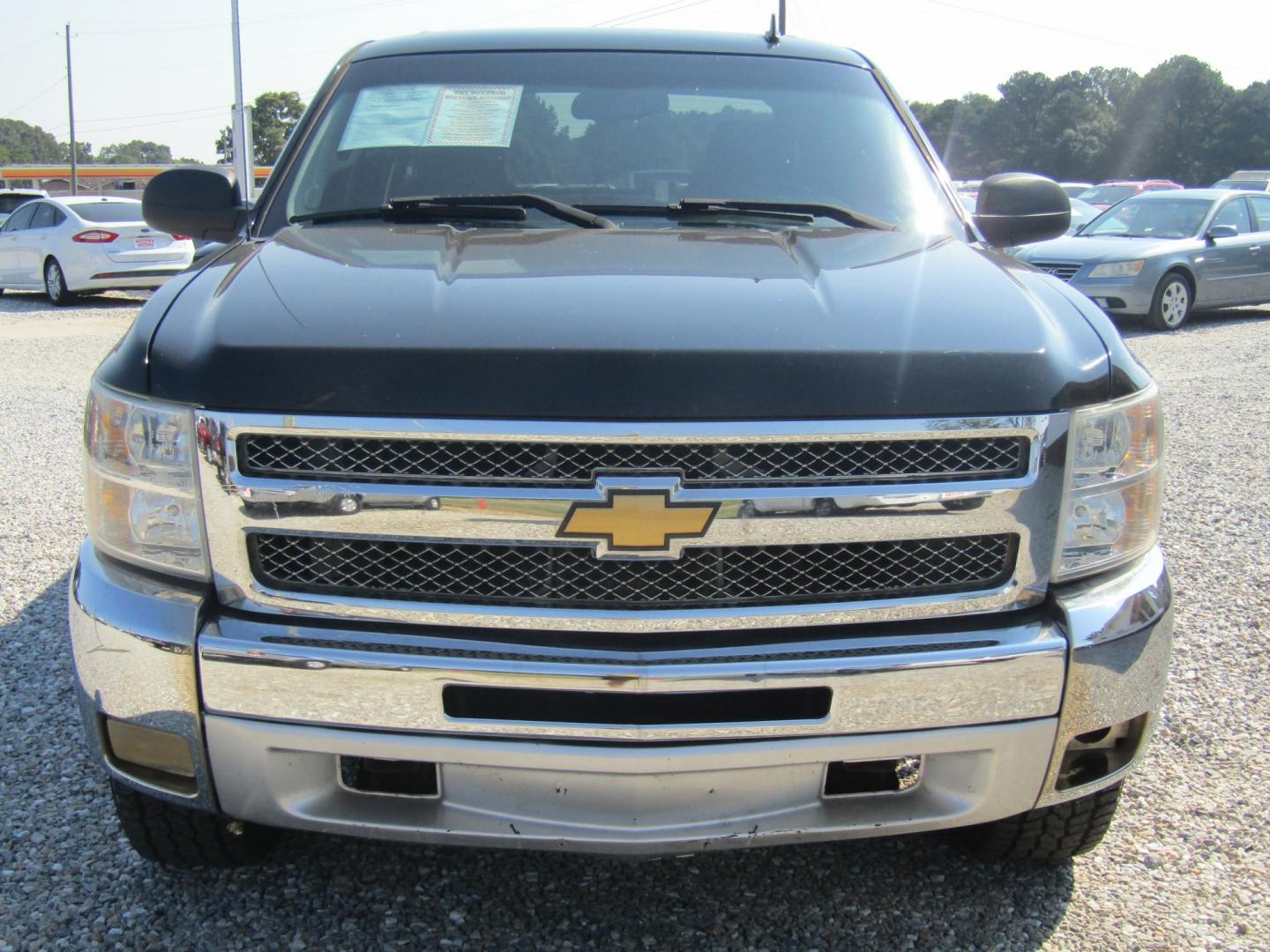 2013 Black Chevrolet Silverado 1500 LT Crew Cab 4WD (3GCPKSE70DG) with an 5.3L V8 OHV 16V FFV engine, Automatic transmission, located at 15016 S Hwy 231, Midland City, AL, 36350, (334) 983-3001, 31.306210, -85.495277 - Photo#1