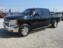 2013 Black Chevrolet Silverado 1500 LT Crew Cab 4WD (3GCPKSE70DG) with an 5.3L V8 OHV 16V FFV engine, Automatic transmission, located at 15016 S Hwy 231, Midland City, AL, 36350, (334) 983-3001, 31.306210, -85.495277 - Photo#2