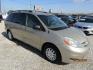 2009 Gold /Tan Toyota Sienna CE FWD 7-Passenger (5TDZK23C09S) with an 3.5L V6 EFI DOHC 24V engine, Automatic transmission, located at 15016 S Hwy 231, Midland City, AL, 36350, (334) 983-3001, 31.306210, -85.495277 - Photo#0