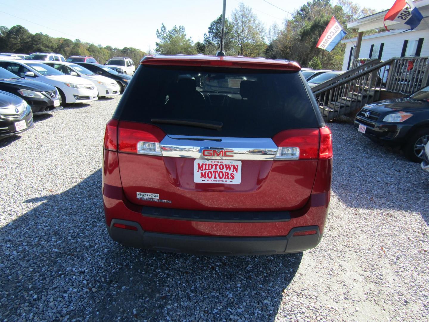 2015 Red GMC Terrain SLE1 FWD (2GKALMEK7F6) with an 2.4L L4 DOHC 16V FFV engine, Automatic transmission, located at 15016 S Hwy 231, Midland City, AL, 36350, (334) 983-3001, 31.306210, -85.495277 - Photo#5