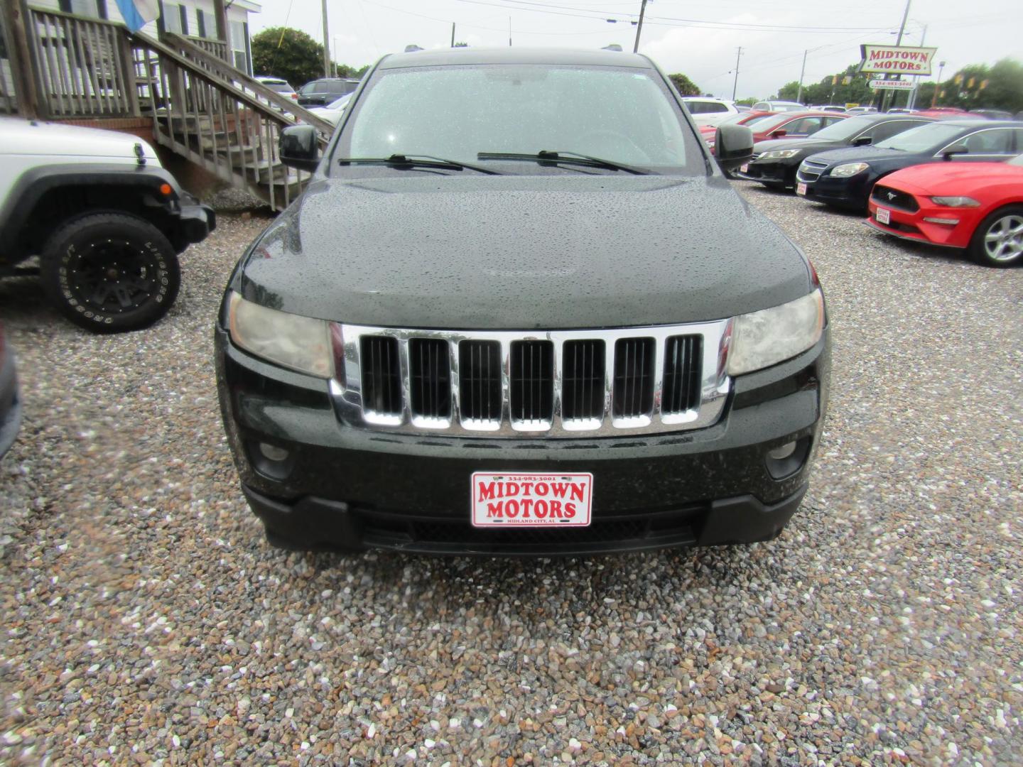 2011 Green /Black Jeep Grand Cherokee Laredo 2WD (1J4RS4GG1BC) with an 3.6L V6 DOHC 24V engine, Automatic transmission, located at 15016 S Hwy 231, Midland City, AL, 36350, (334) 983-3001, 31.306210, -85.495277 - Photo#1