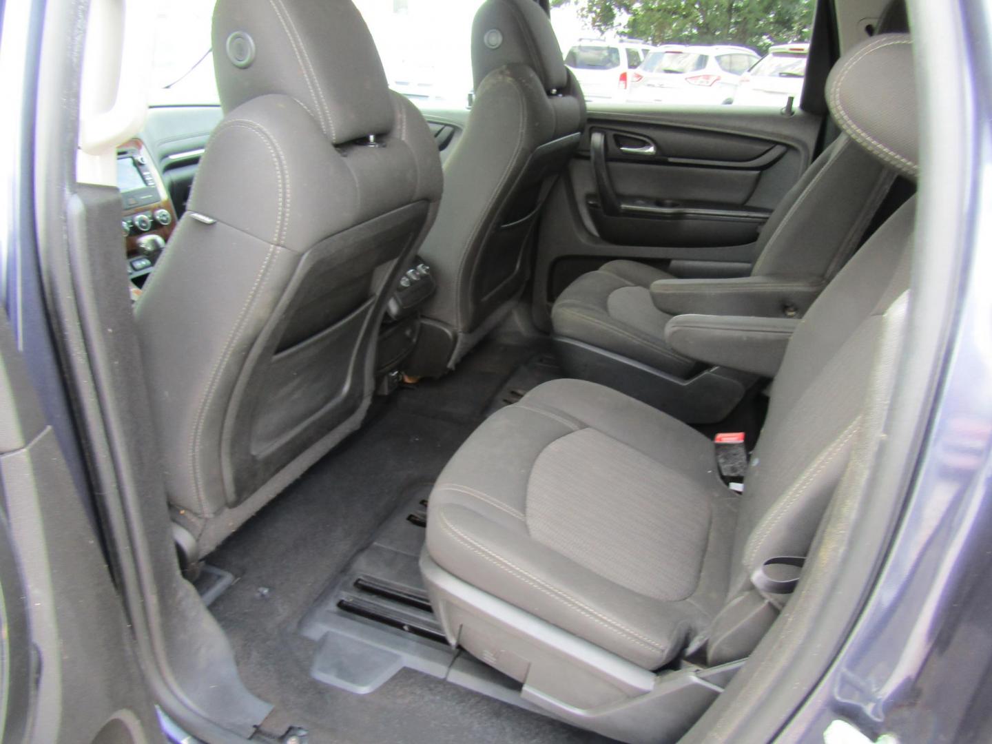 2014 Blue Chevrolet Traverse 1LT FWD (1GNKRGKD4EJ) with an 3.6L V6 DOHC 24V engine, Automatic transmission, located at 15016 S Hwy 231, Midland City, AL, 36350, (334) 983-3001, 31.306210, -85.495277 - Photo#4