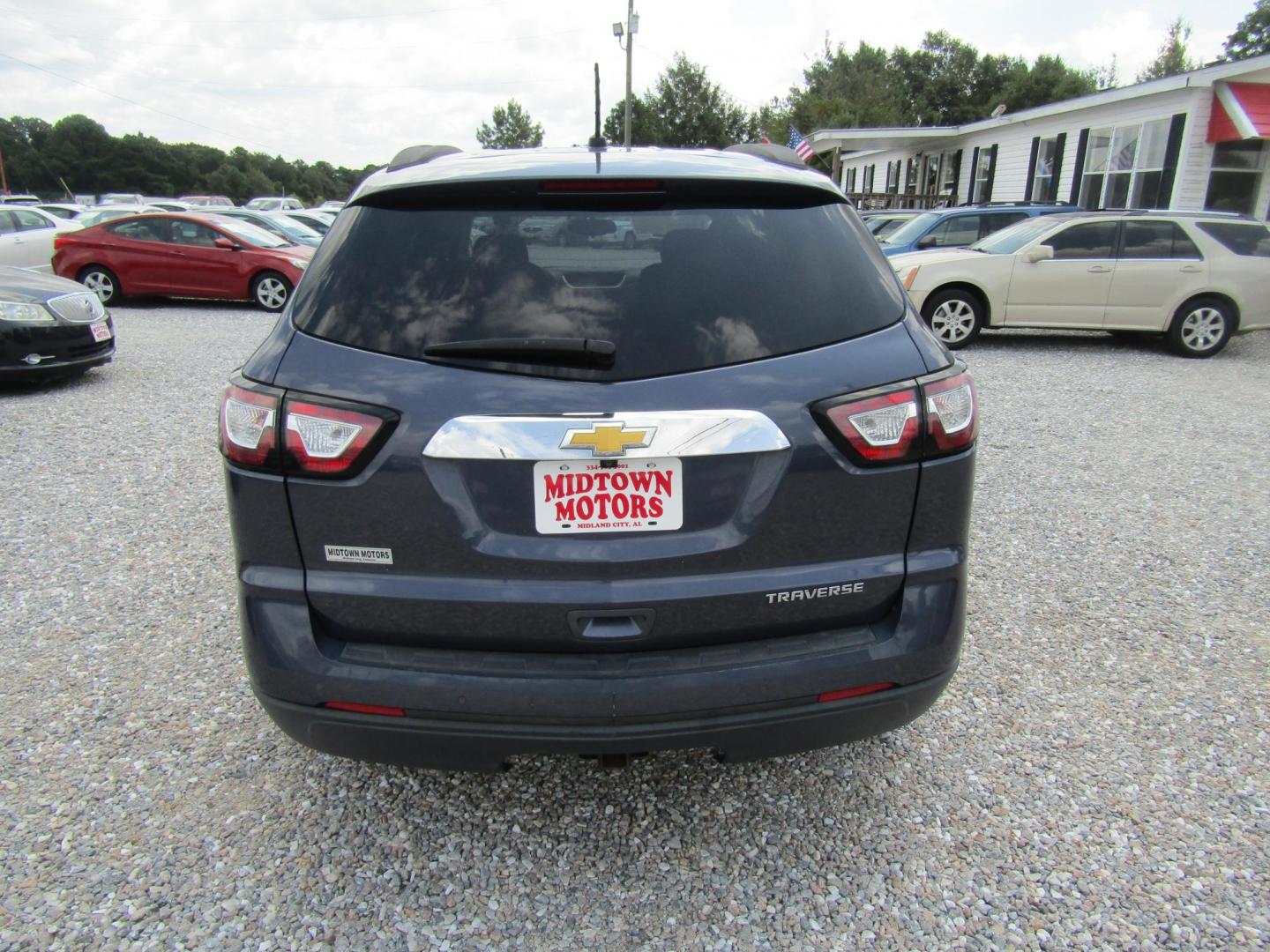 2014 Blue Chevrolet Traverse 1LT FWD (1GNKRGKD4EJ) with an 3.6L V6 DOHC 24V engine, Automatic transmission, located at 15016 S Hwy 231, Midland City, AL, 36350, (334) 983-3001, 31.306210, -85.495277 - Photo#6