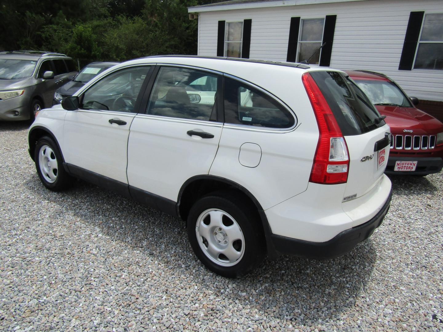 2012 White Honda CR-V EX-L 2WD 5-Speed AT (5J6RM3H73CL) with an 2.4L L4 DOHC 16V engine, Automatic transmission, located at 15016 S Hwy 231, Midland City, AL, 36350, (334) 983-3001, 31.306210, -85.495277- Photo#5