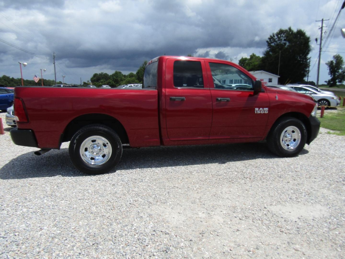 2013 Maroon /Black RAM 1500 Tradesman Quad Cab 2WD (1C6RR6FP3DS) with an 4.7L V8 SOHC 16V engine, Automatic transmission, located at 15016 S Hwy 231, Midland City, AL, 36350, (334) 983-3001, 31.306210, -85.495277 - Photo#7