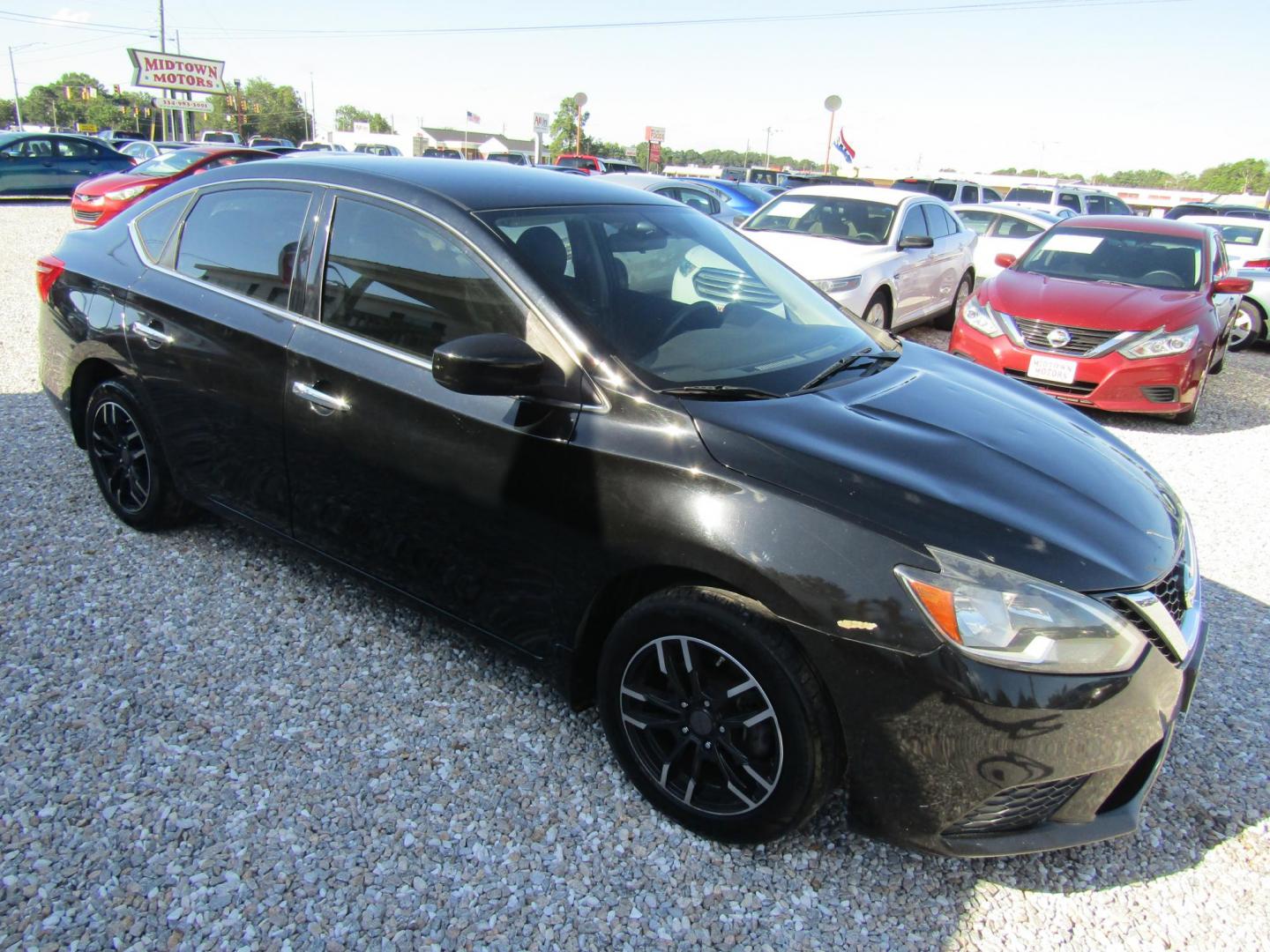2016 Black Nissan Sentra FE+ S (3N1AB7AP0GL) with an 1.8L L4 SFI DOHC 16V engine, Automatic transmission, located at 15016 S Hwy 231, Midland City, AL, 36350, (334) 983-3001, 31.306210, -85.495277 - Photo#0