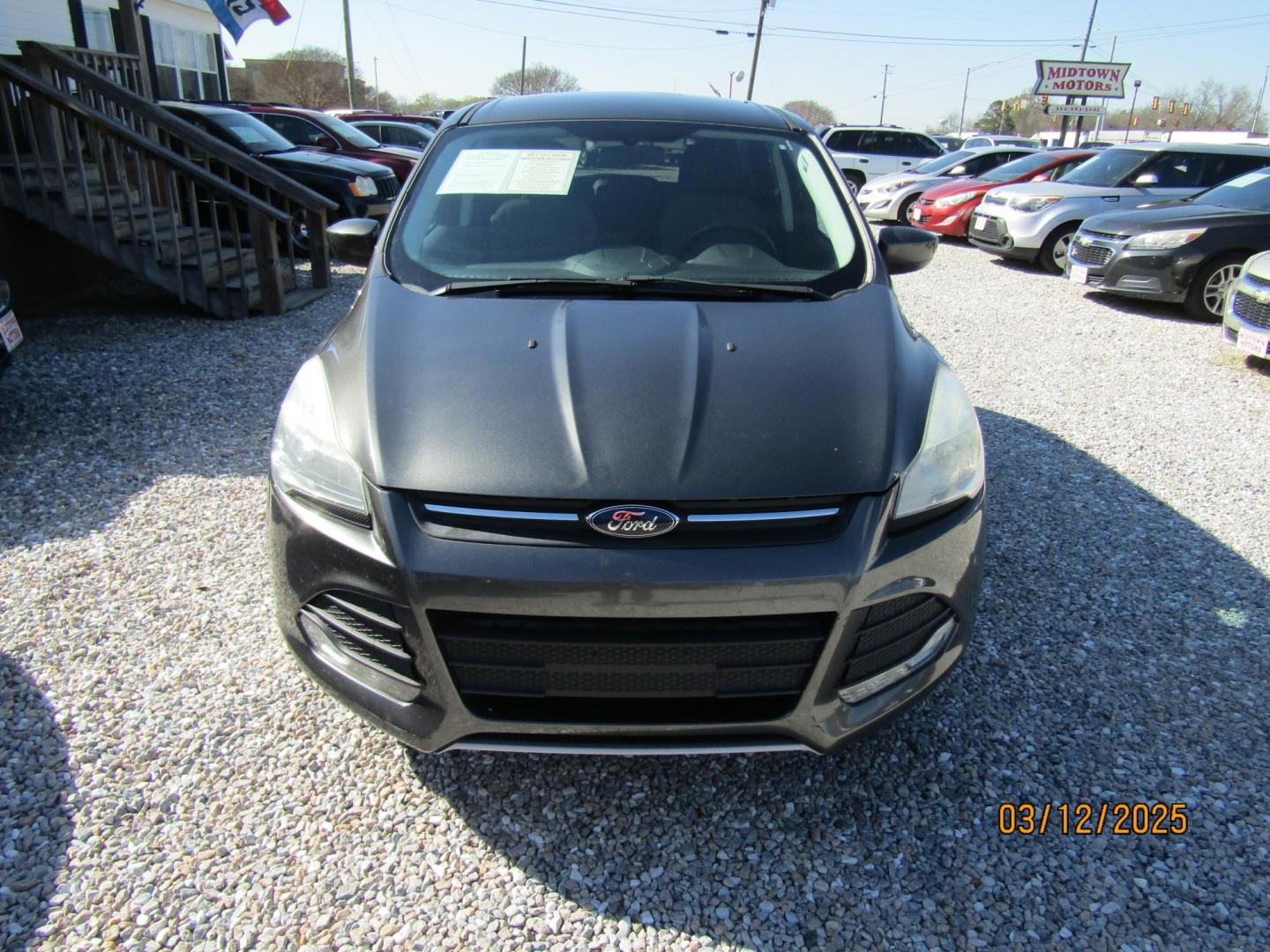 2016 Gray Ford Escape SE FWD (1FMCU0G99GU) with an 2.0L L4 DOHC 16V engine, Automatic transmission, located at 15016 S Hwy 231, Midland City, AL, 36350, (334) 983-3001, 31.306210, -85.495277 - Photo#3