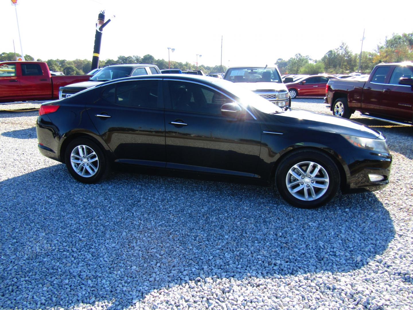 2013 Black Kia Optima LX MT (5XXGM4A72DG) with an 2.4L L4 DOHC 16V engine, 5-Speed Manual transmission, located at 15016 S Hwy 231, Midland City, AL, 36350, (334) 983-3001, 31.306210, -85.495277 - Photo#0