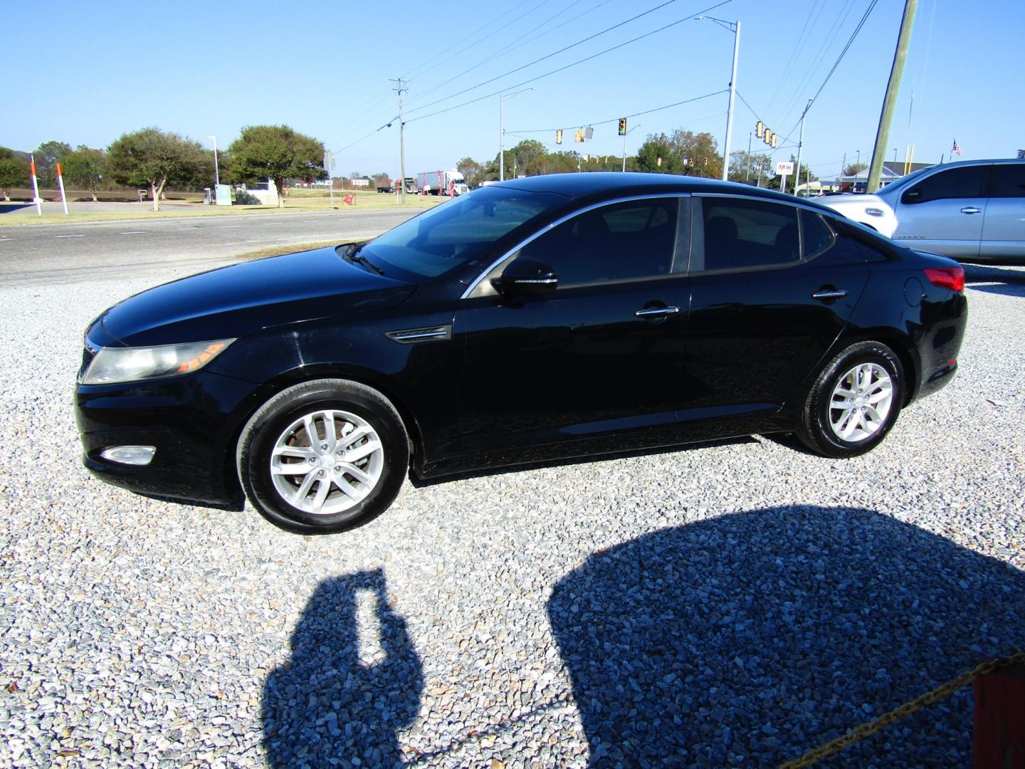 2013 Black Kia Optima LX MT (5XXGM4A72DG) with an 2.4L L4 DOHC 16V engine, 5-Speed Manual transmission, located at 15016 S Hwy 231, Midland City, AL, 36350, (334) 983-3001, 31.306210, -85.495277 - Photo#2