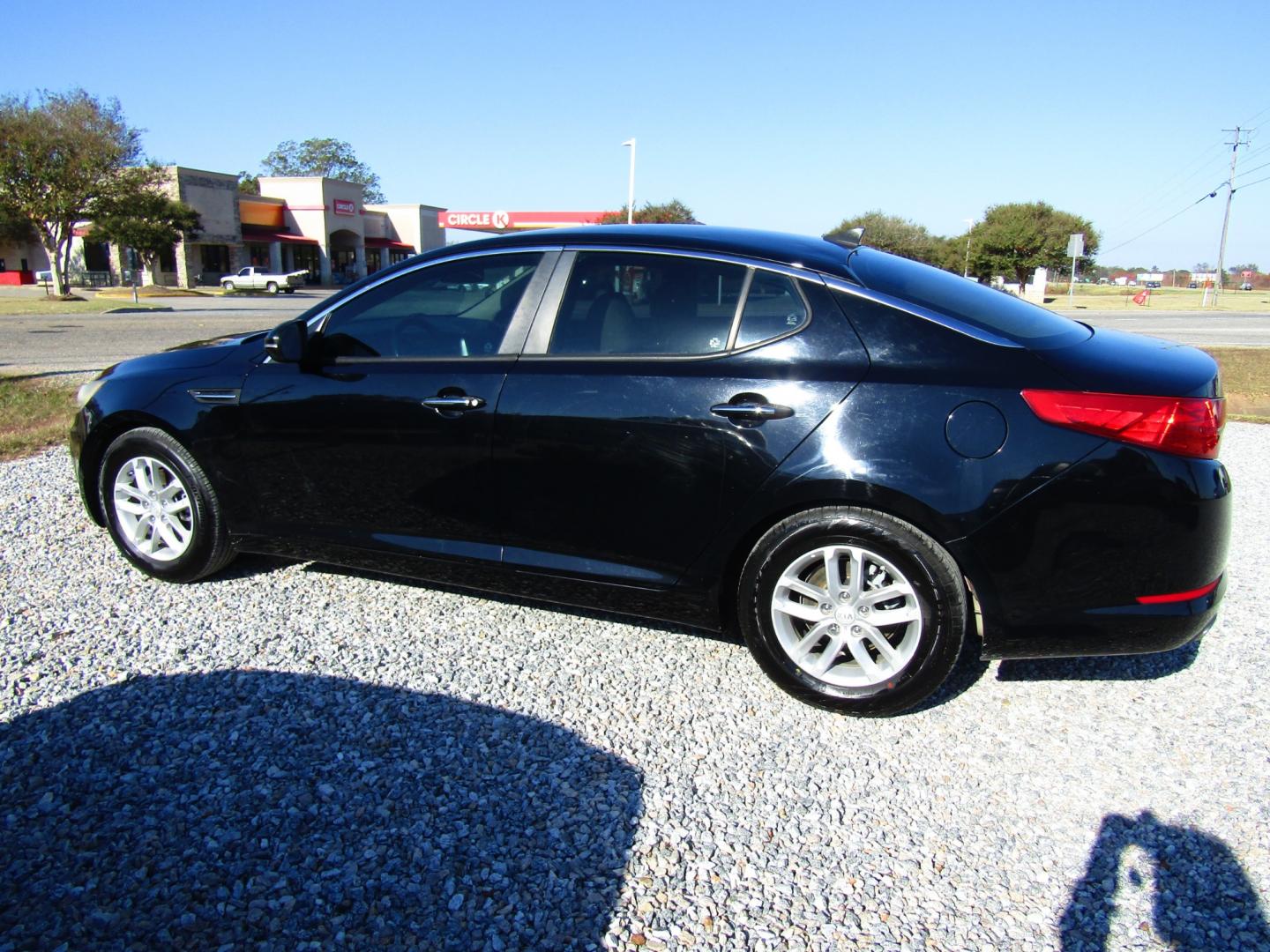 2013 Black Kia Optima LX MT (5XXGM4A72DG) with an 2.4L L4 DOHC 16V engine, 5-Speed Manual transmission, located at 15016 S Hwy 231, Midland City, AL, 36350, (334) 983-3001, 31.306210, -85.495277 - Photo#5