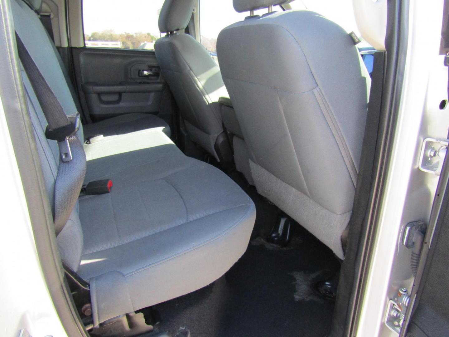 2014 Silver RAM 1500 SLT Quad Cab 4WD (1C6RR7GT9ES) with an 5.7L V8 OHV 16V engine, Automatic transmission, located at 15016 S Hwy 231, Midland City, AL, 36350, (334) 983-3001, 31.306210, -85.495277 - Photo#8