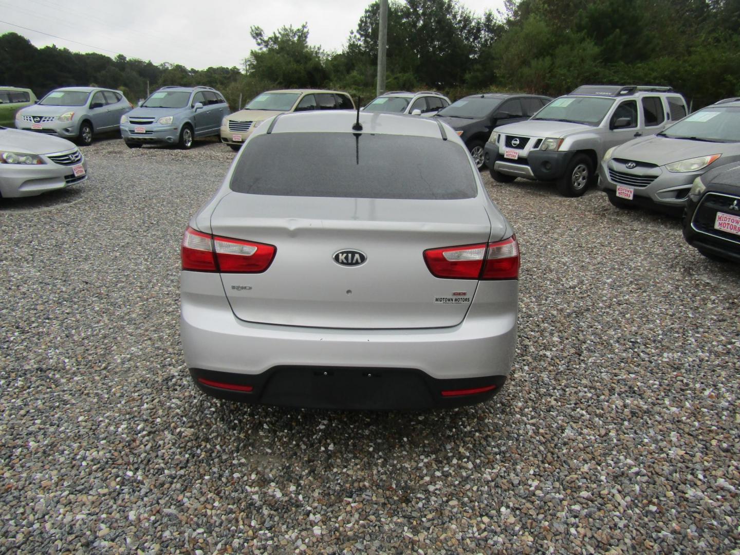 2014 Silver Kia Rio LX (KNADM4A31E6) with an 1.6L L4 DOHC 16V engine, Automatic transmission, located at 15016 S Hwy 231, Midland City, AL, 36350, (334) 983-3001, 31.306210, -85.495277 - Photo#6