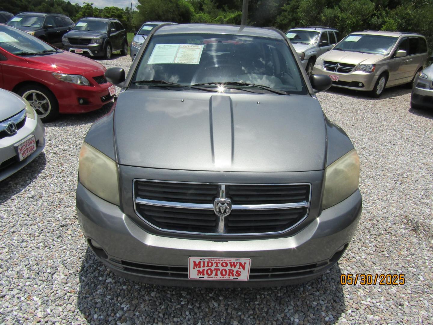 2012 Gray Dodge Caliber SXT (1C3CDWDA2CD) with an 2.0L L4 DOHC 16V engine, Automatic transmission, located at 15016 S Hwy 231, Midland City, AL, 36350, (334) 983-3001, 31.306210, -85.495277 - Photo#1