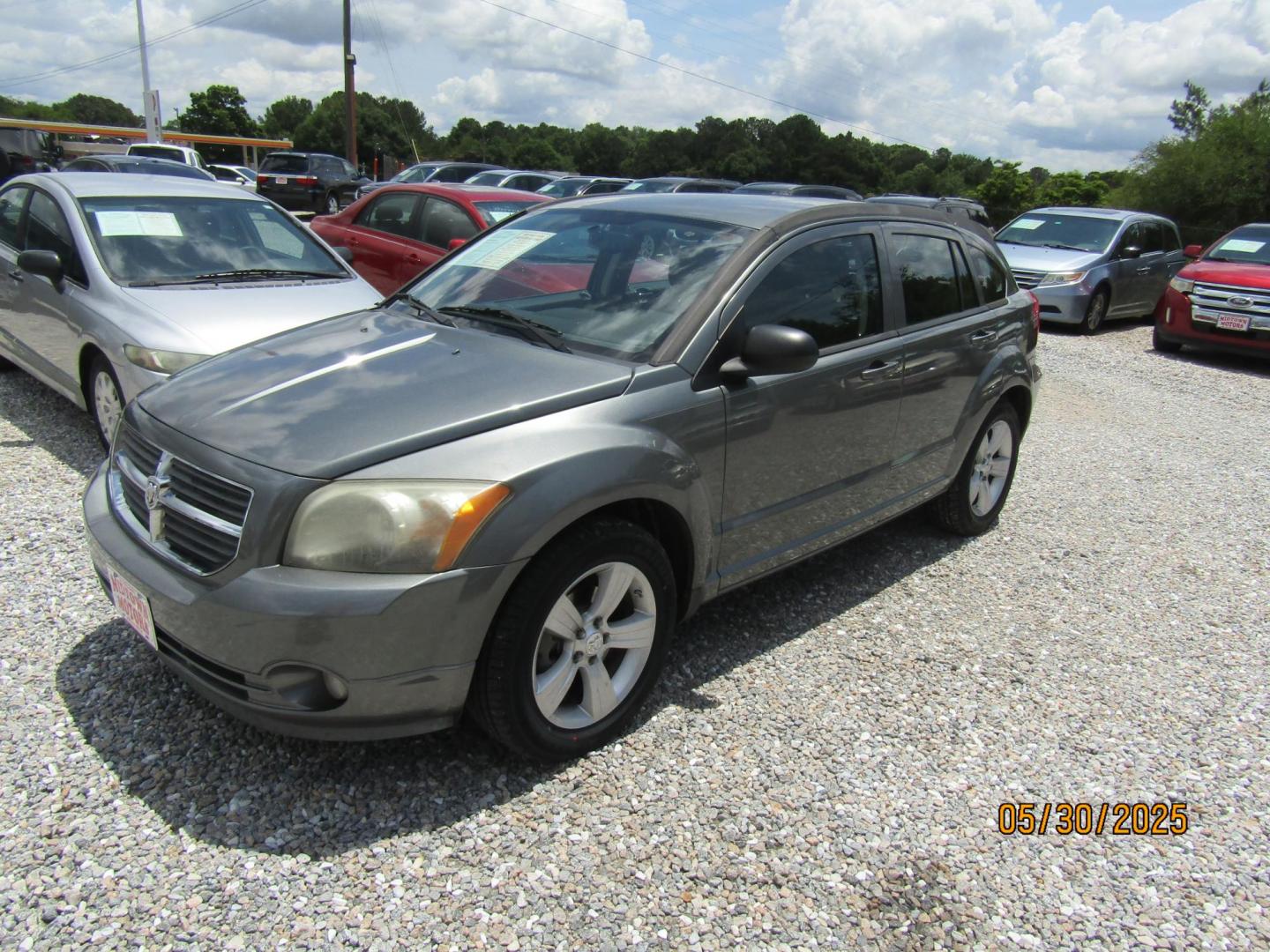 2012 Gray Dodge Caliber SXT (1C3CDWDA2CD) with an 2.0L L4 DOHC 16V engine, Automatic transmission, located at 15016 S Hwy 231, Midland City, AL, 36350, (334) 983-3001, 31.306210, -85.495277 - Photo#2