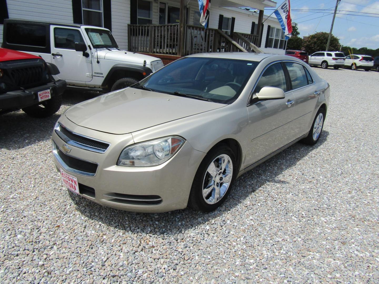 2012 Gold Chevrolet Malibu 2LT (1G1ZD5E0XCF) with an 2.4L L4 DOHC 16V engine, Automatic transmission, located at 15016 S Hwy 231, Midland City, AL, 36350, (334) 983-3001, 31.306210, -85.495277 - Photo#2