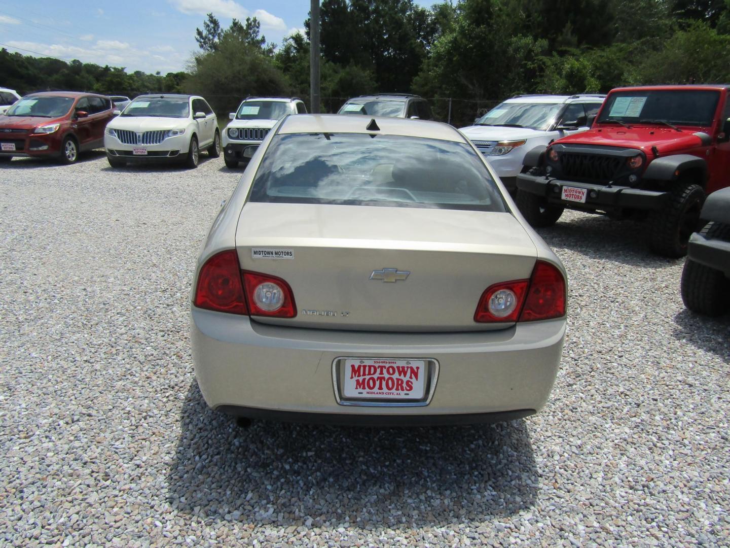 2012 Gold Chevrolet Malibu 2LT (1G1ZD5E0XCF) with an 2.4L L4 DOHC 16V engine, Automatic transmission, located at 15016 S Hwy 231, Midland City, AL, 36350, (334) 983-3001, 31.306210, -85.495277 - Photo#6